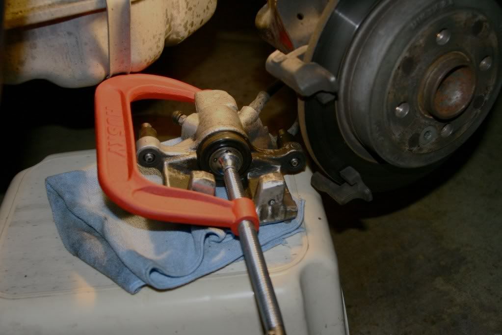 Difficulty compressing the rear brake piston (while rotating). Why