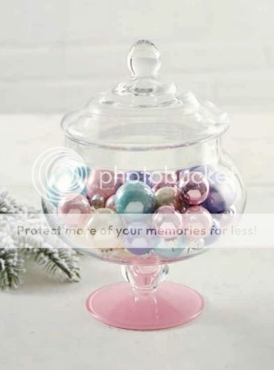 glass jar filled with pretty christmas baubles