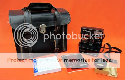 Polaroid Sun 660 Instant Film Camera with case & manual  